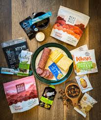 A tray of salami cheese and other packaged foods perfect for easy snacks that don't go bad